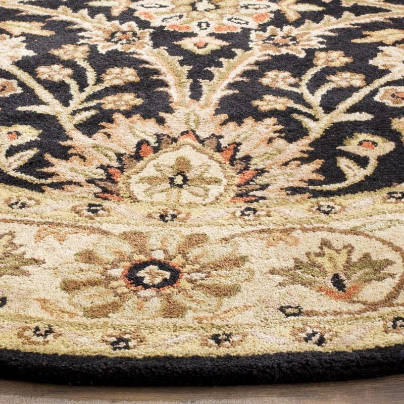 Antiquity AT249 Hand Tufted Area Rug - Black - 8' round - Safavieh.