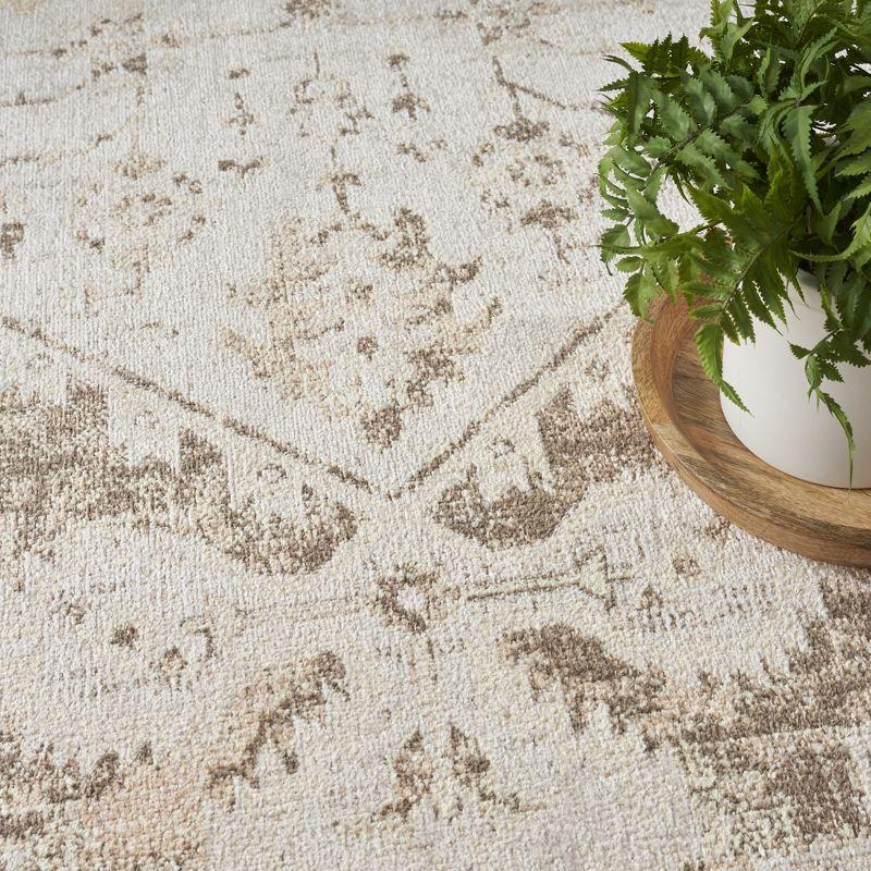 Haydel Oriental Machine Washable Power Loom Polyester Area Rug in Beige