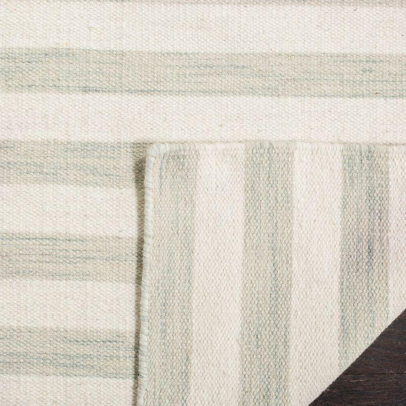 Dhurries DHU575 Hand Woven Flat Weave Area Rug Light Blue / Ivory 8' X 10' - Safavieh.
