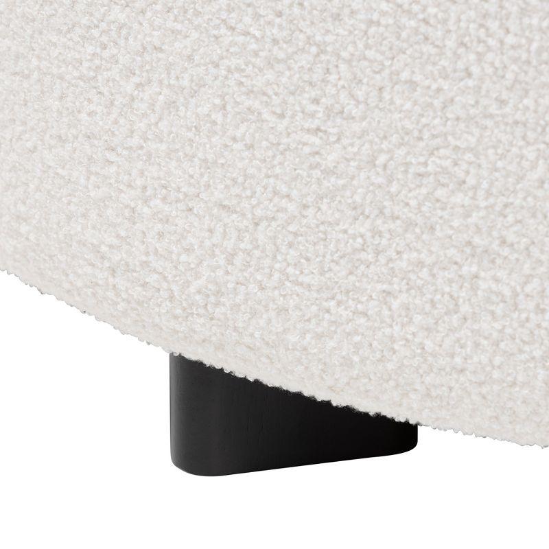 Baxton Studio Athena Modern and Contemporary Ivory Boucle Upholstered and Black Finished Wood Round Ottoman