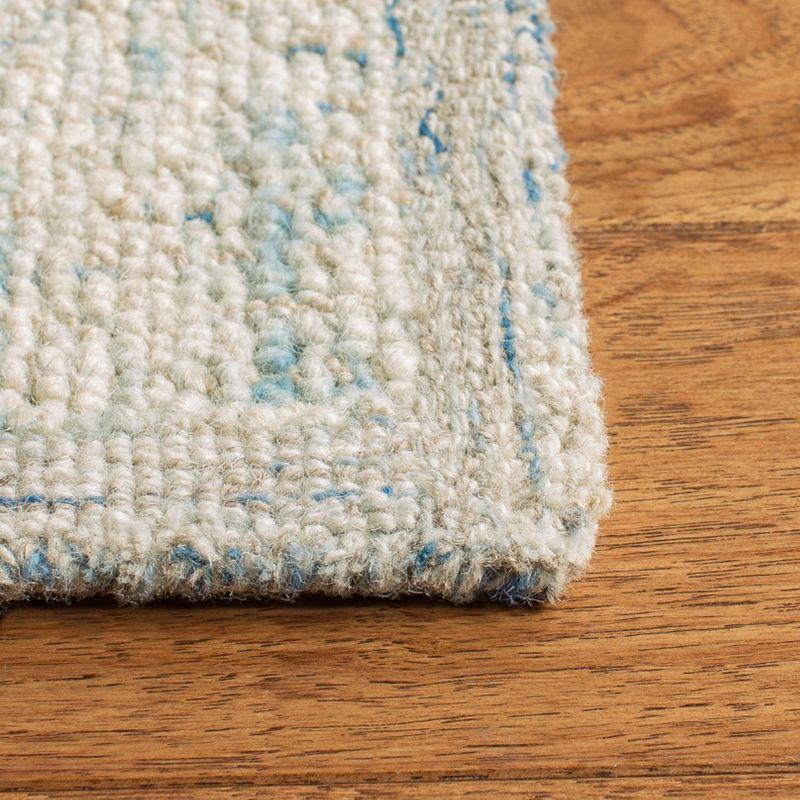 Ivory and Light Blue Abstract Wool 6' x 9' Area Rug