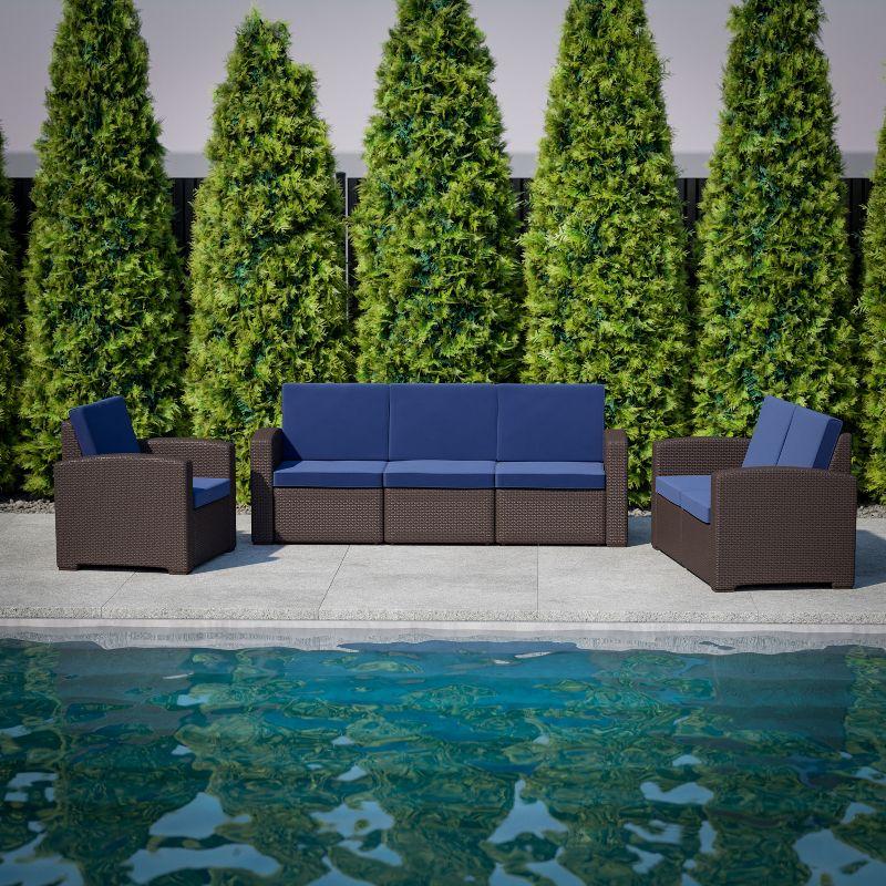 Seneca Brown Faux Rattan Loveseat with Navy Cushions