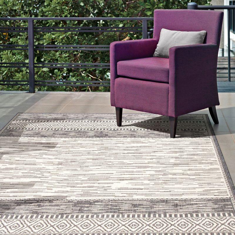 Reversible Gray Synthetic 7'6" x 10'9" Easy-Care Outdoor Area Rug