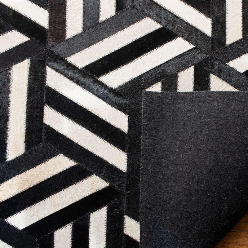 Handmade Geometric Black Cowhide 3' x 5' Area Rug