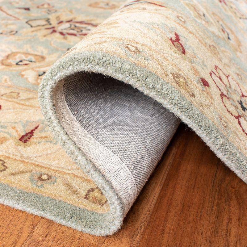 Antiquity AT249 Hand Tufted Area Rug - Light Blue/Ivory - 7'6"x9'6" Oval - Safavieh.