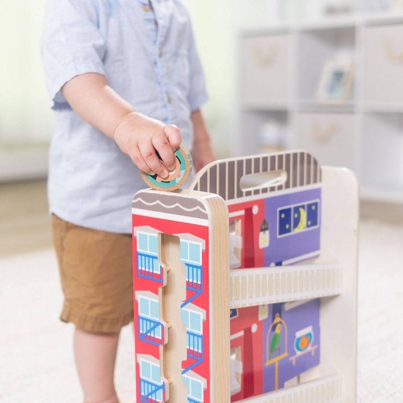 Colorful Wooden Town House Tumble Playset with Disks