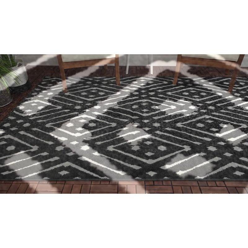 Light Blue Geometric 4' x 6' Synthetic Outdoor Area Rug