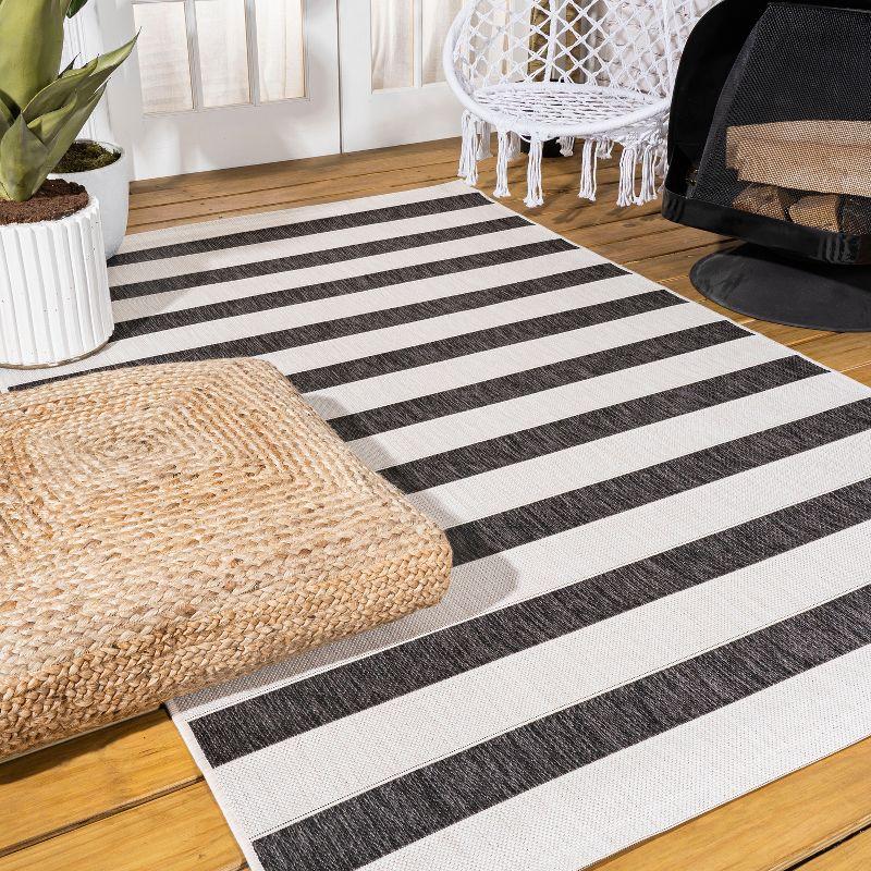 8'x10' Aveiro Wide Stripe Indoor/Outdoor Area Rug, Black/Cream - JONATHAN Y