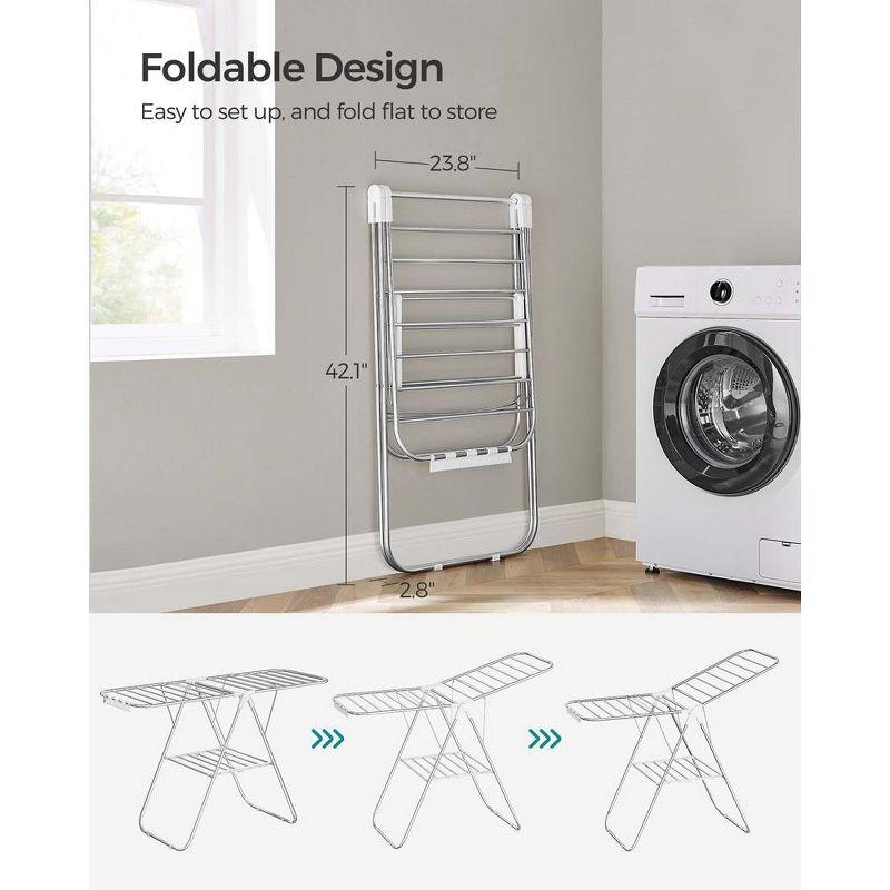 SONGMICS Foldable Clothes Drying Rack with Sock Clips Laundry Drying Rack with Height-Adjustable Gullwings