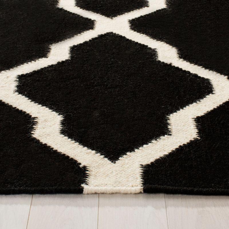 Dhurries DHU634 Hand Woven Area Rug - Black/Ivory - 5'x8' - Safavieh.
