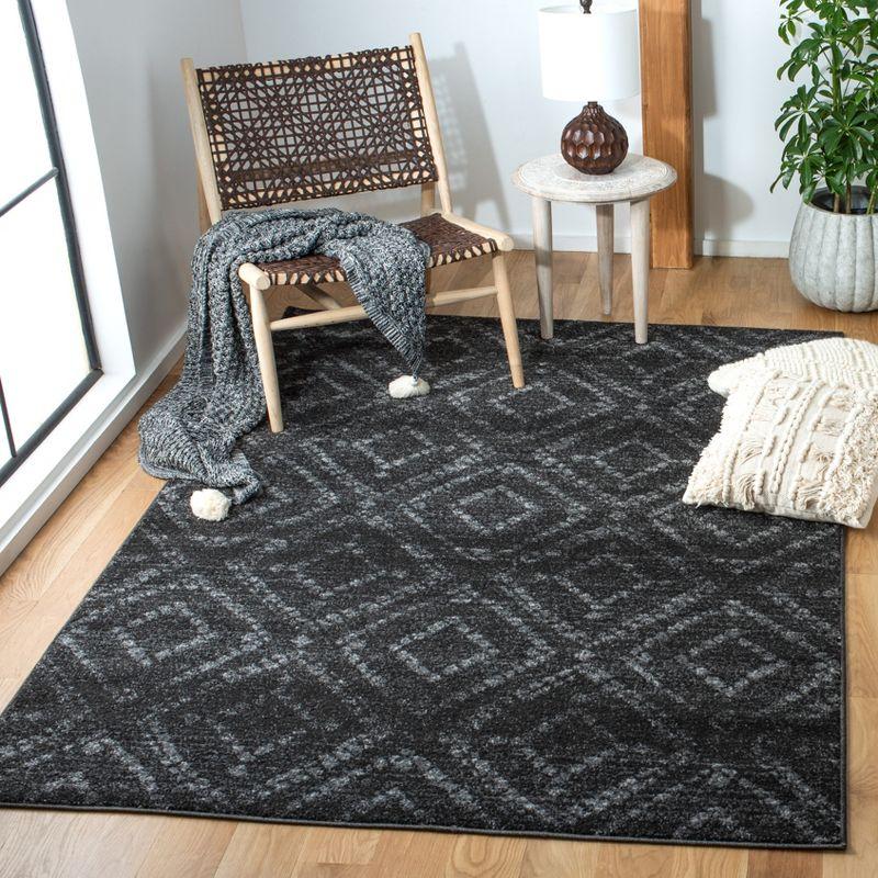 Dark Grey Geometric 4' x 6' Reversible Synthetic Area Rug