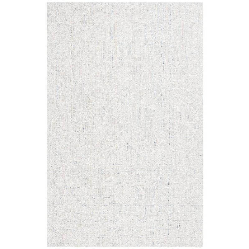 Ebony EBN111 Hand Tufted Area Rug - Blue/Ivory - 5'x8' - Safavieh.