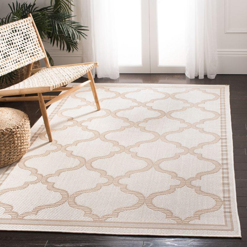 Ivory Beige Trellis 5'3" x 7'6" Stain-Resistant Outdoor Area Rug