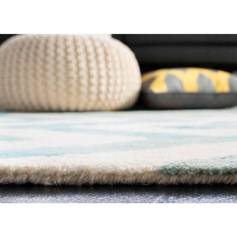 Dip Dye DDY715 Hand Tufted Area Rug - Ivory/Turquoise - 8'x10' - Safavieh.