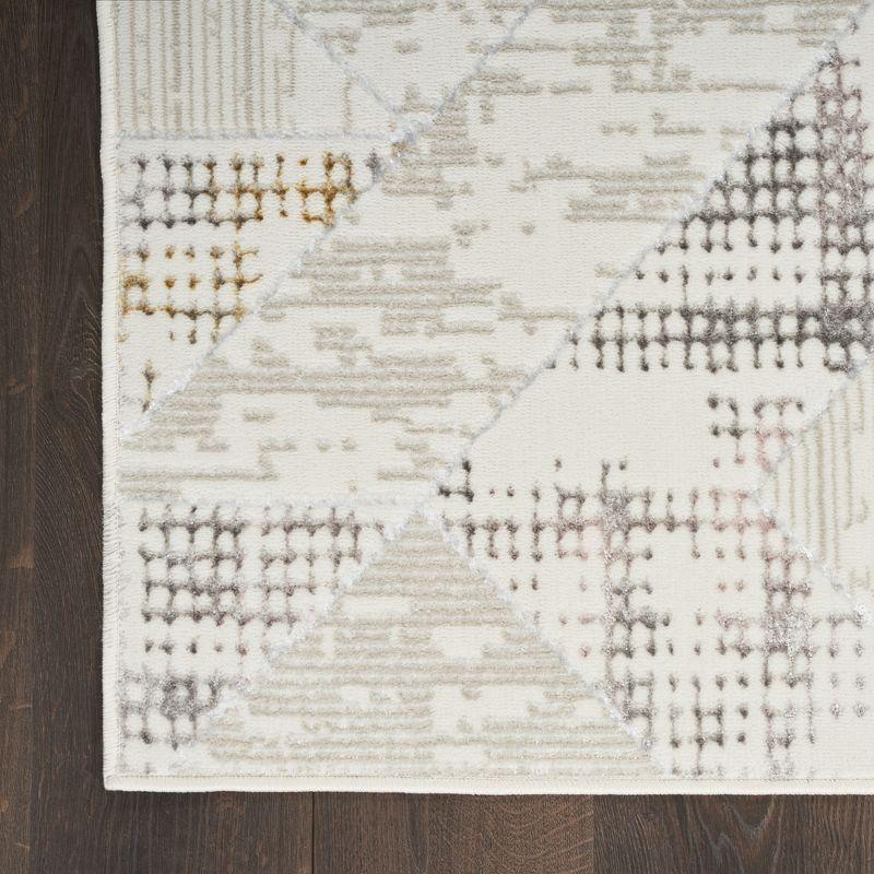 Ivory Abstract Shimmer 5' x 7' Synthetic Area Rug