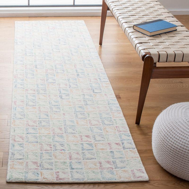 Ivory and Blue Hand-Tufted Wool Area Rug