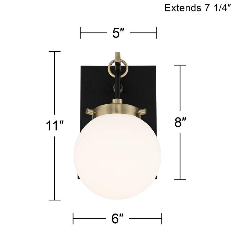 Modern Black and Brass Wall Sconce with Frosted Glass Globe