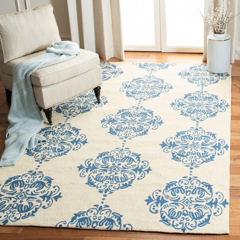 Ivory and Blue Floral Hand-Hooked Wool Area Rug 4' x 6'