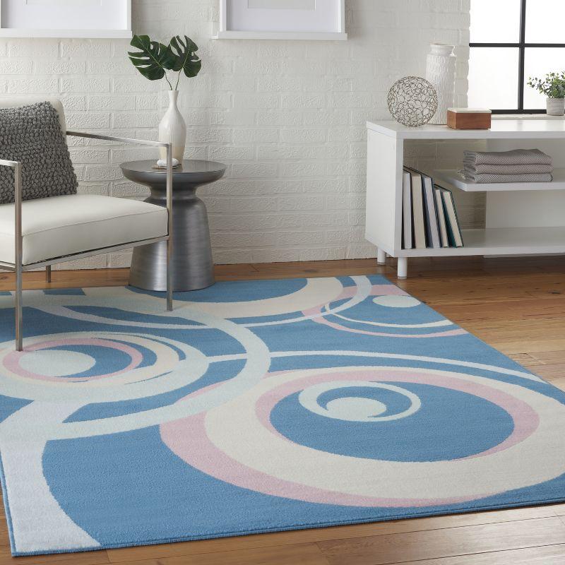 Retro Blue Multi Concentric Ring 6' x 9' Synthetic Area Rug