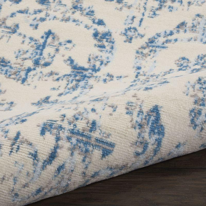 Ivory and Blue Distressed Damask 3' x 5' Area Rug