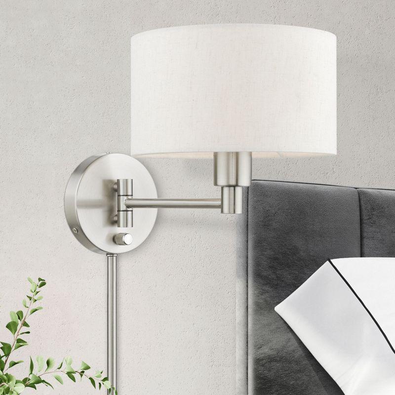 Willa Arlo™ Interiors Tyonna Steel Swing Arm Sconce
