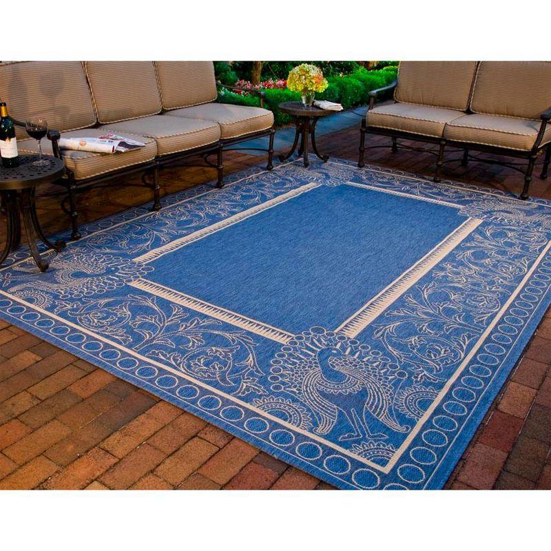 Blue and Natural Synthetic Stain-Resistant Indoor/Outdoor Area Rug