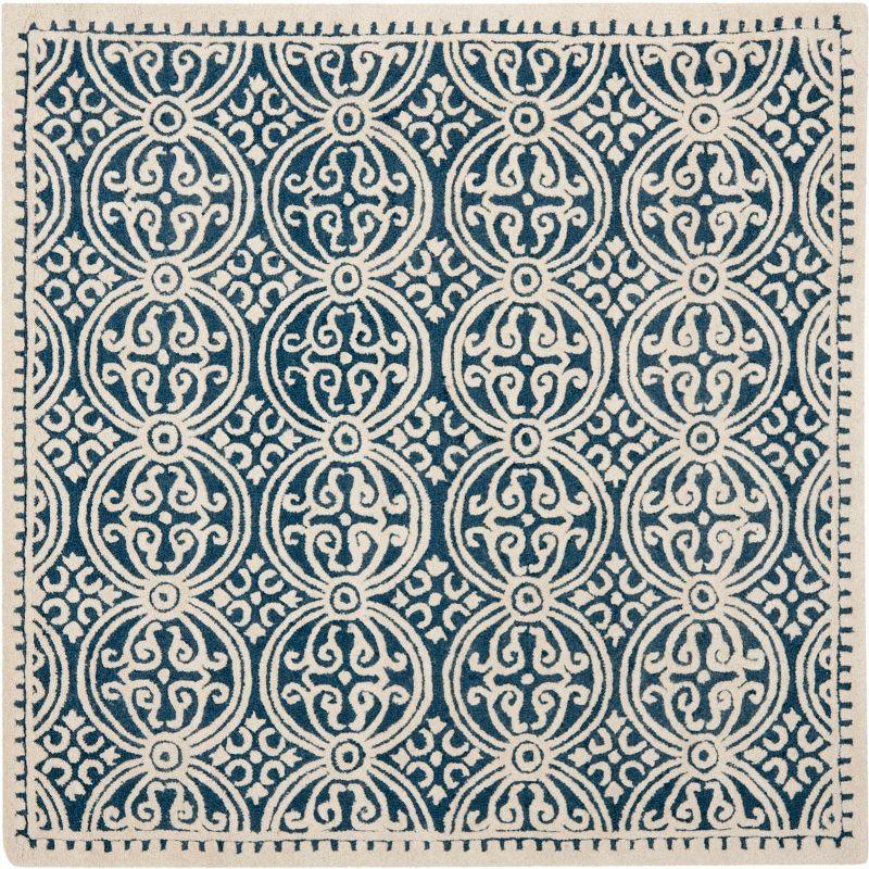 Cambridge CAM123 Hand Tufted Area Rug  - Safavieh