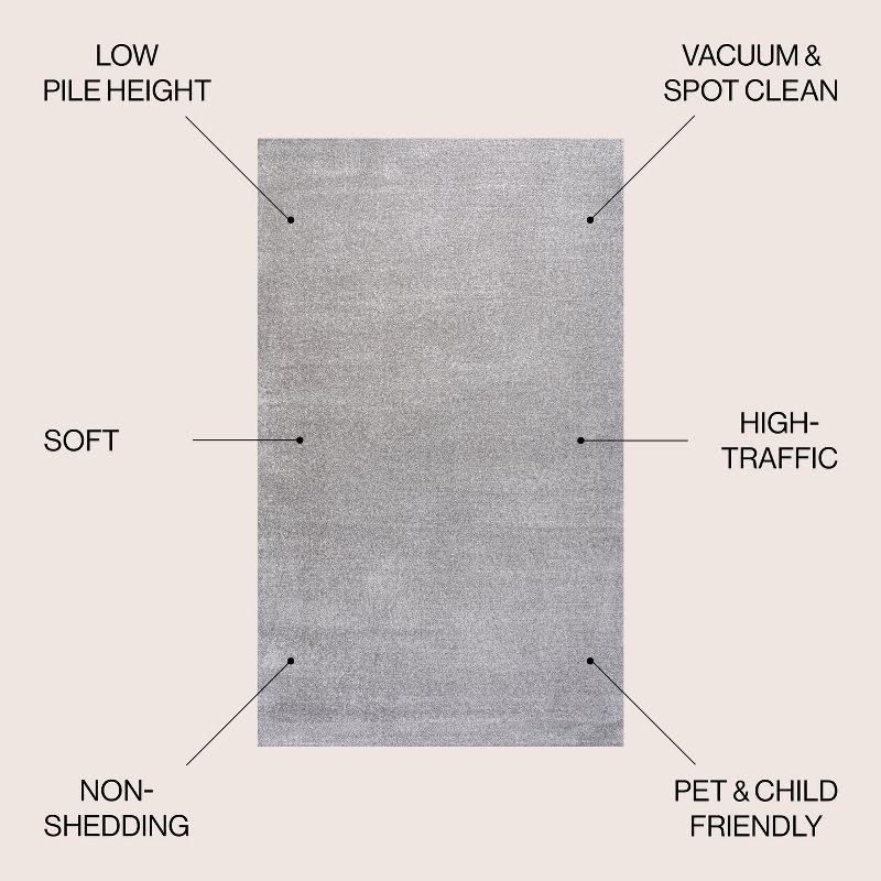 8'x10' Haze Solid Low-Pile Area Rug, Light Gray - JONATHAN Y