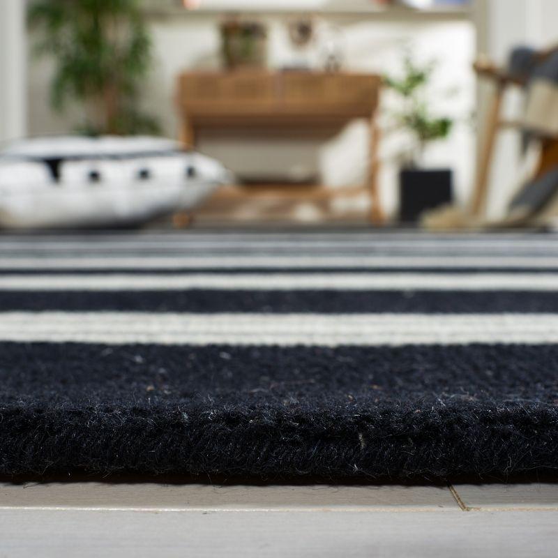 Handmade Black and Ivory Wool Striped Area Rug