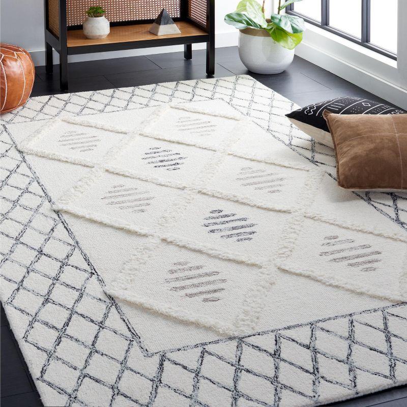 Ivory and Black Hand-Tufted Wool Shag Area Rug 4' x 6'