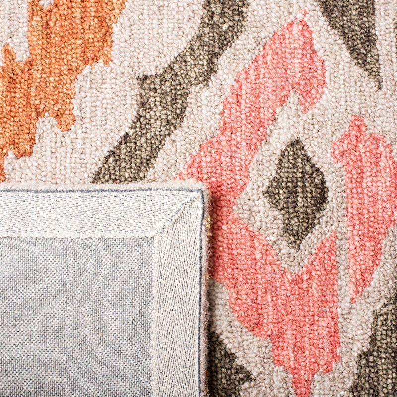Ikat IKT337 Hand Tufted Area Rug - Beige/Pink - 8'9"x11'9" - Safavieh.