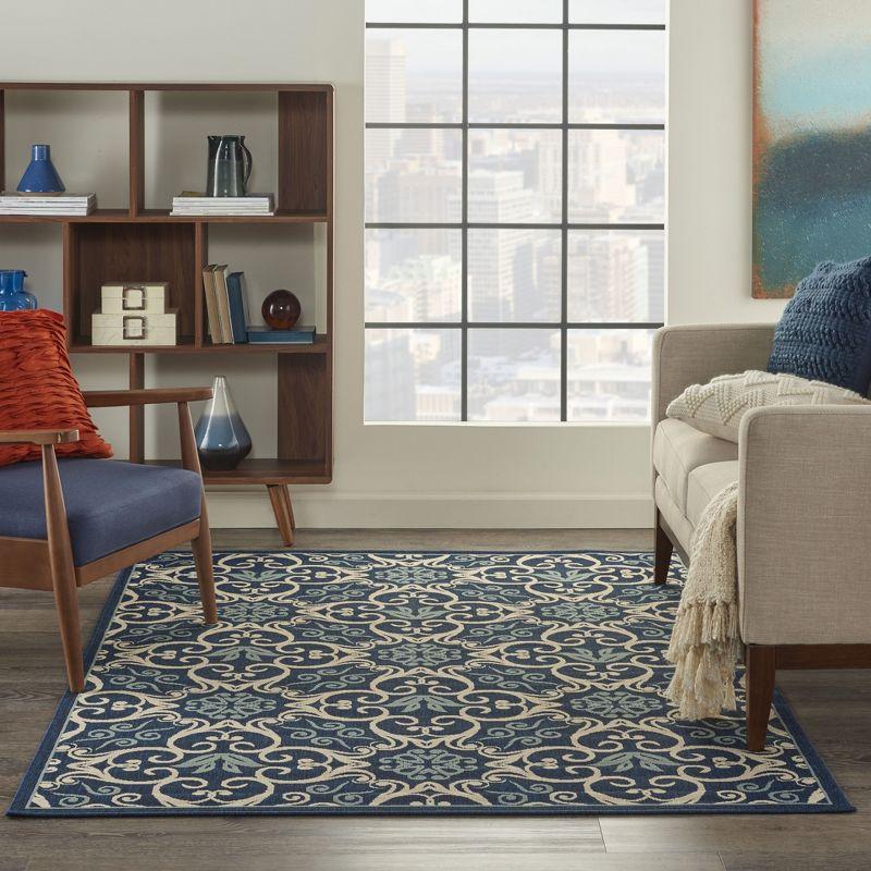 Navy Floral Synthetic Rectangular 4' x 6' Area Rug