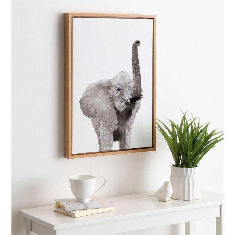 Young Elephant with Raised Trunk Framed Canvas Art