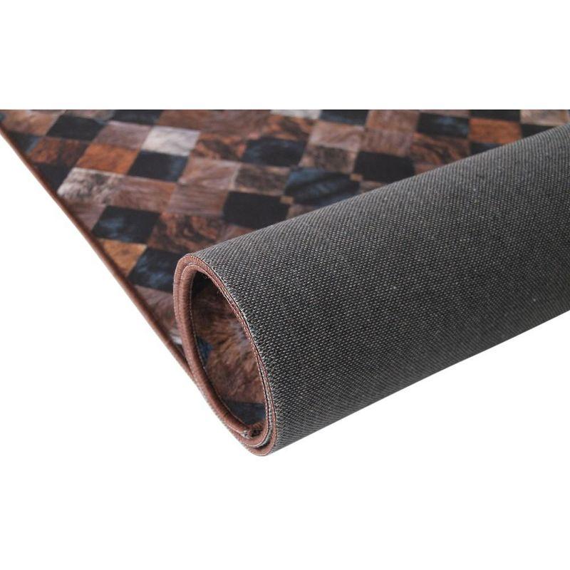 6' x 9' Black and Brown Faux Cowhide Area Rug