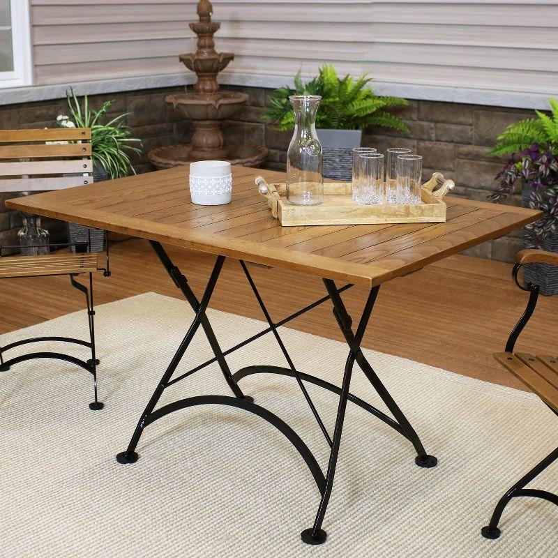 Chestnut Wood Folding Patio Dining Table with Black Steel Frame