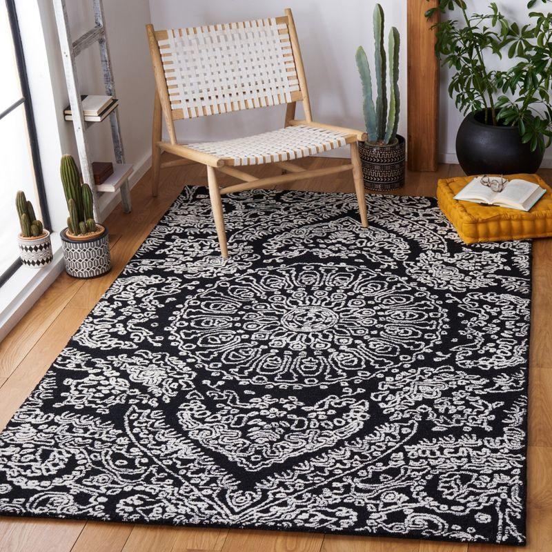 Black and Ivory Floral Hand-Tufted Wool 6' x 9' Area Rug