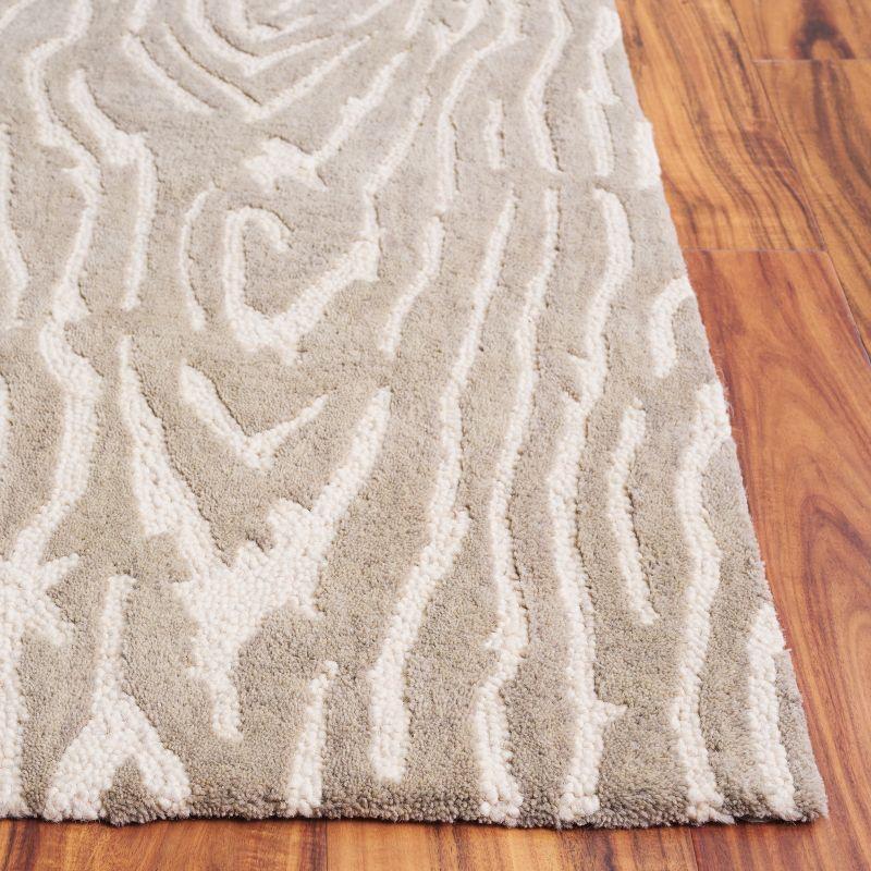 Ebony EBN550 Handmade Tufted Area Rug - Grey/Ivory - 6' X 9' - Safavieh