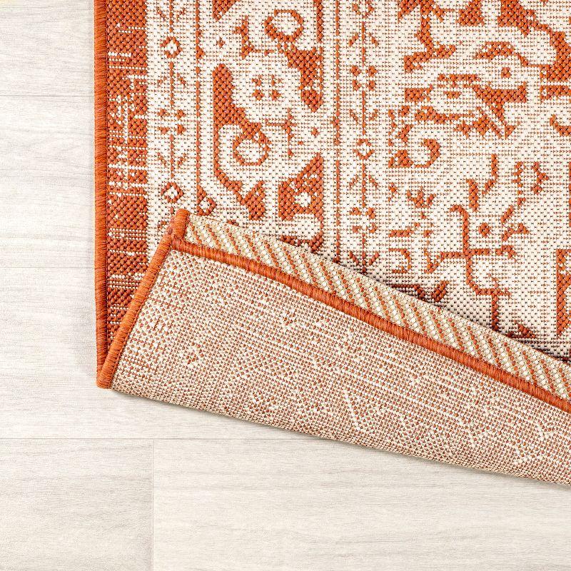9' x 12' Sinjuri Medallion Textured Weave Indoor/Outdoor Area Rug, Orange/Cream - JONATHAN Y