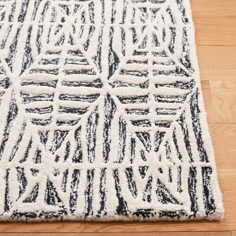 Black and Ivory Tufted Wool 8' x 10' Area Rug