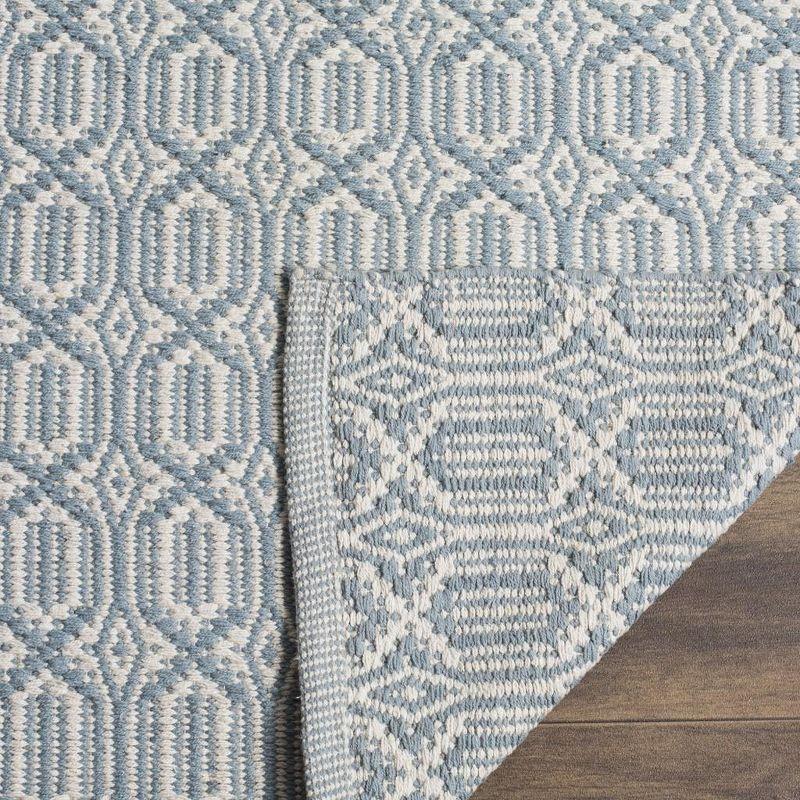 Ivory and Blue Handwoven Wool Cotton Area Rug, 6' x 9'