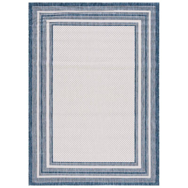 Ivory and Navy Rectangular Synthetic Indoor/Outdoor Rug