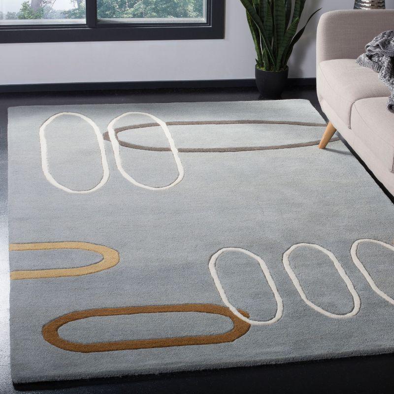 Soho SOH801 Hand Tufted Indoor Area Rug - Blue/Multi - 5'x8' - Safavieh