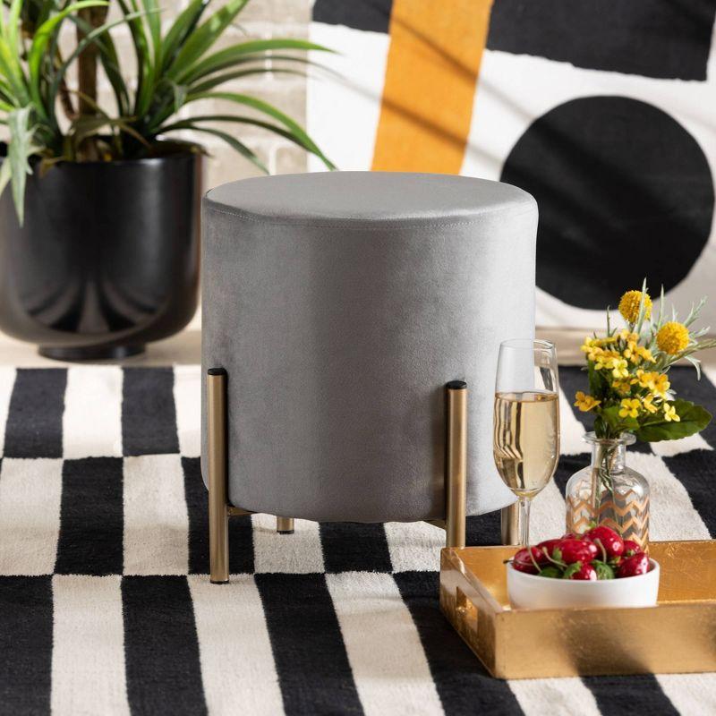 Luxe Grey Velvet and Gold Metal Round Ottoman