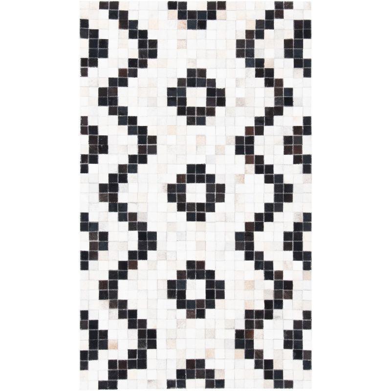 Handmade Black and White Geometric Cowhide Rug