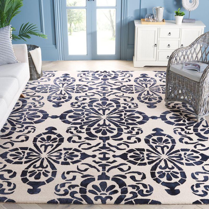 Dip Dye DDY719 Hand Tufted Area Rug - Ivory/Navy - 8'x10' - Safavieh.