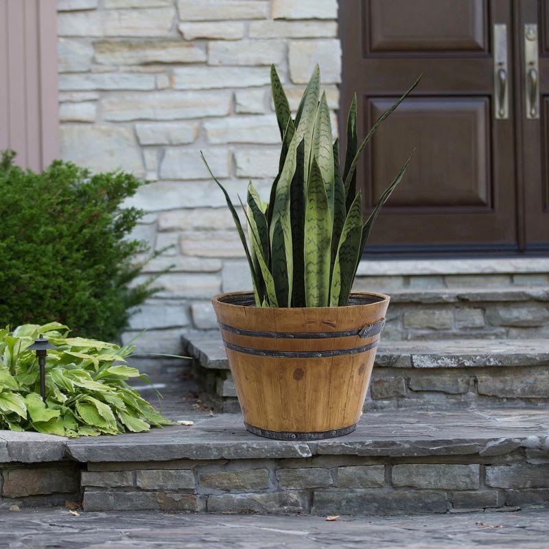 LuxenHome Set of 2 Rustic Brown Faux Wood Barrel MgO Planters