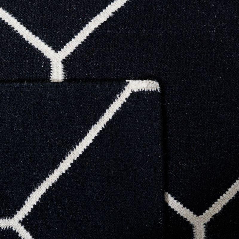 Dhurries DHU635 Hand Woven Area Rug - Black/Ivory - 6'x9' - Safavieh.