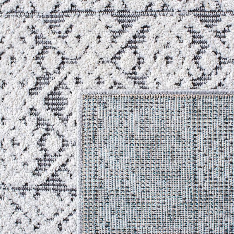 Ivory and Gray Geometric Synthetic Indoor/Outdoor Rug