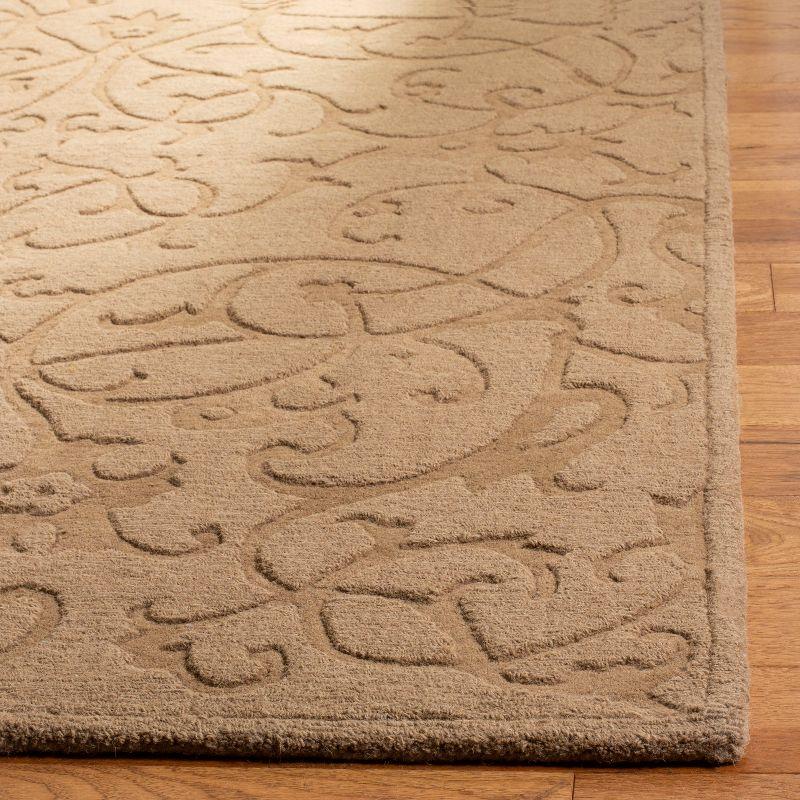 Impressions IM341 Hand Loomed Area Rug - Light Brown - 7'6"x9'6" - Safavieh.