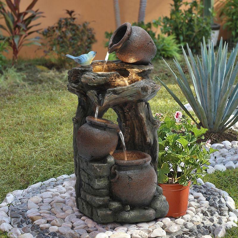 LuxenHome Rustic Pots and Pitchers on Tree Resin Outdoor Fountain with Lights Brown